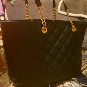 Classy but fierce purse. B-O-S-S BUSSINESS WOMEN